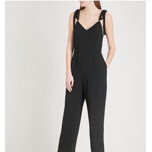 SANDRO ELLANDE JUMPSUIT WITH BEADED V NECK